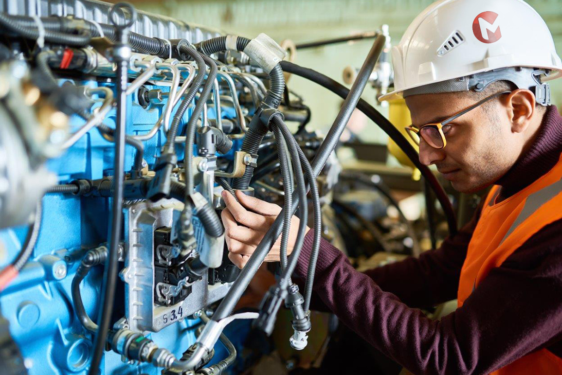 Man inspecting machinery
